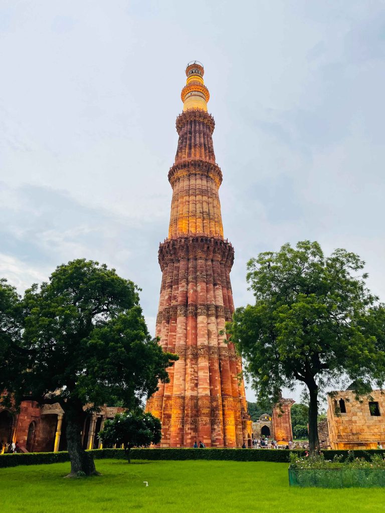 A view of the Qutub Minar from the gardens surrounding it. 